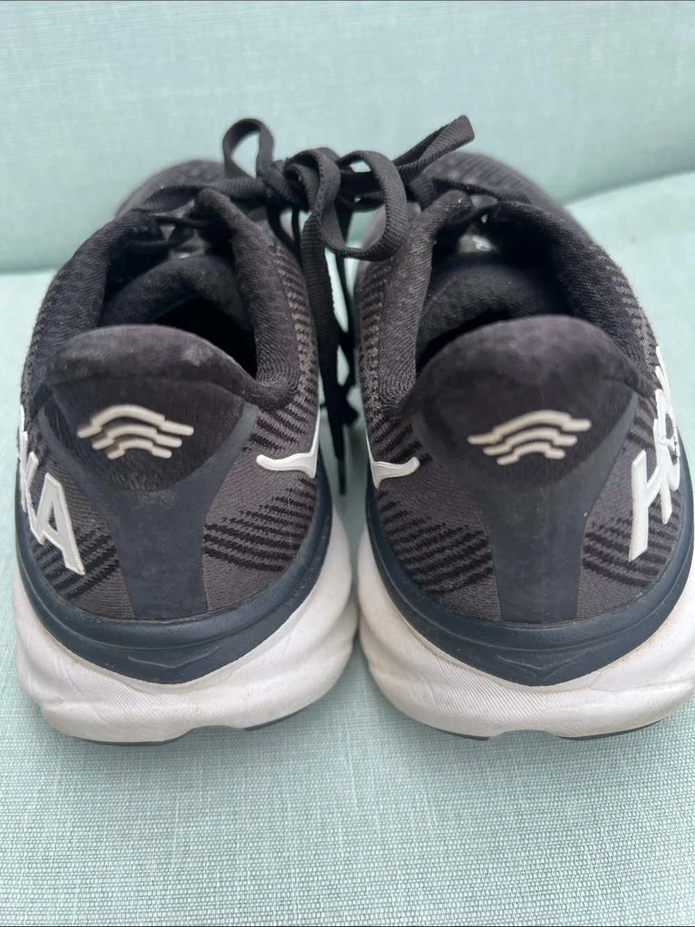 Hoka Black and White Clifton 9 Cushioned Running Shoes